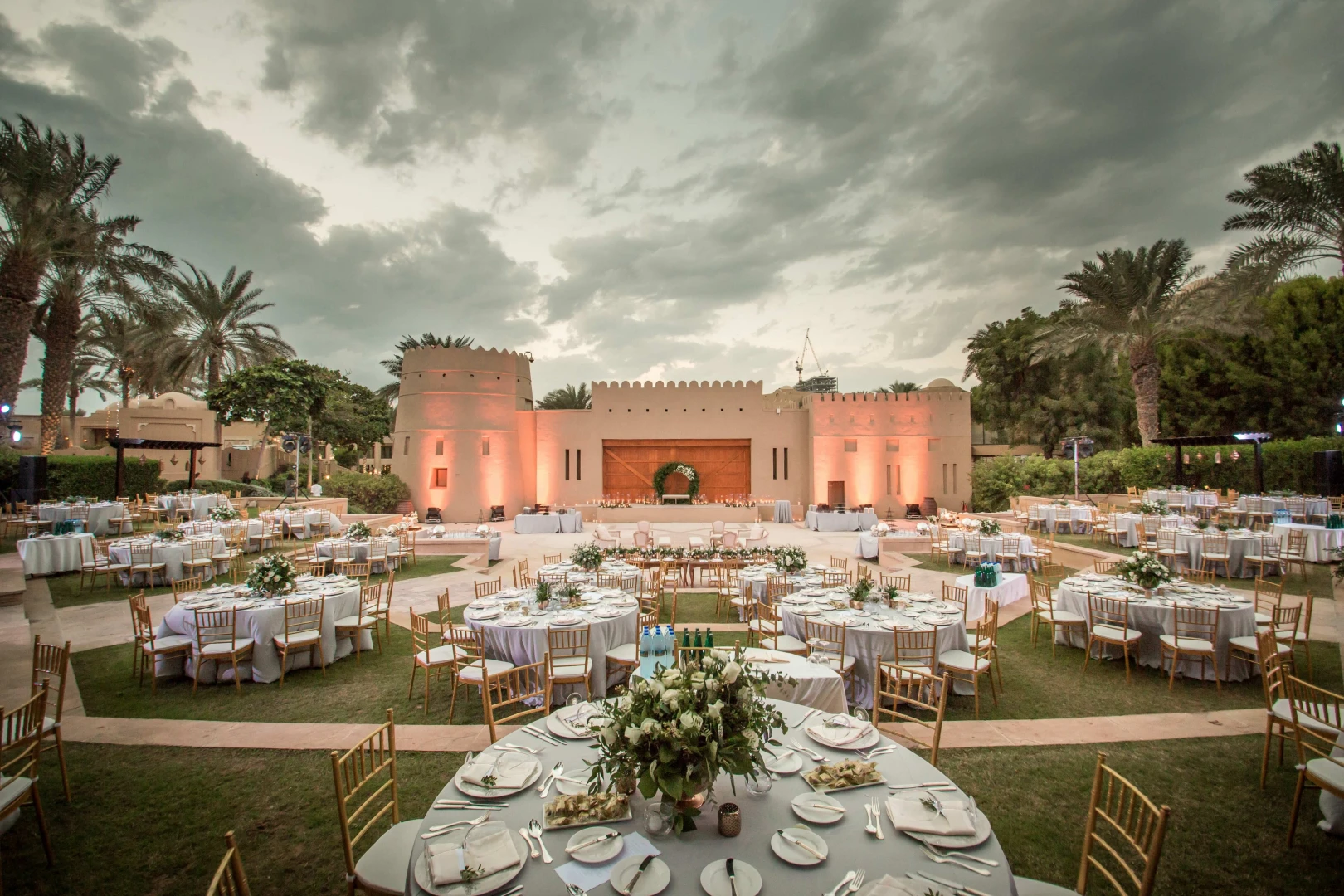 Elegant outdoor event setup at One&Only Royal Mirage, Dubai amphitheatre.