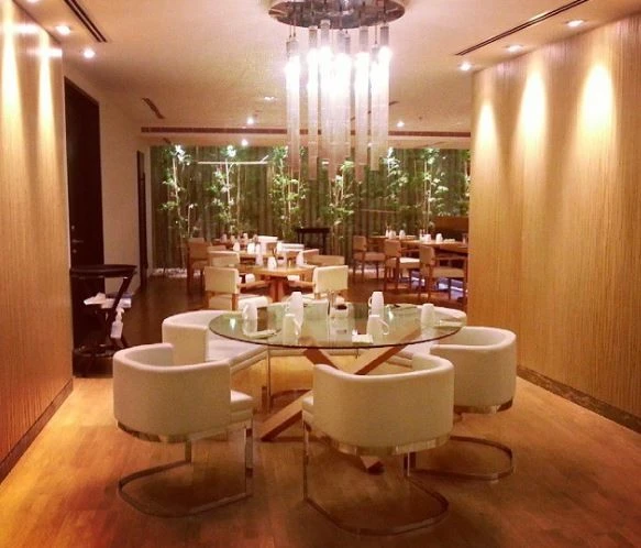Elegant dining area at Kitchen 6 Restaurant, Dubai with modern decor.