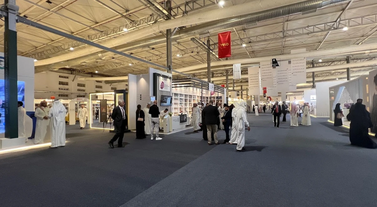 People walking inside Riyadh International Convention & Exhibition Center.