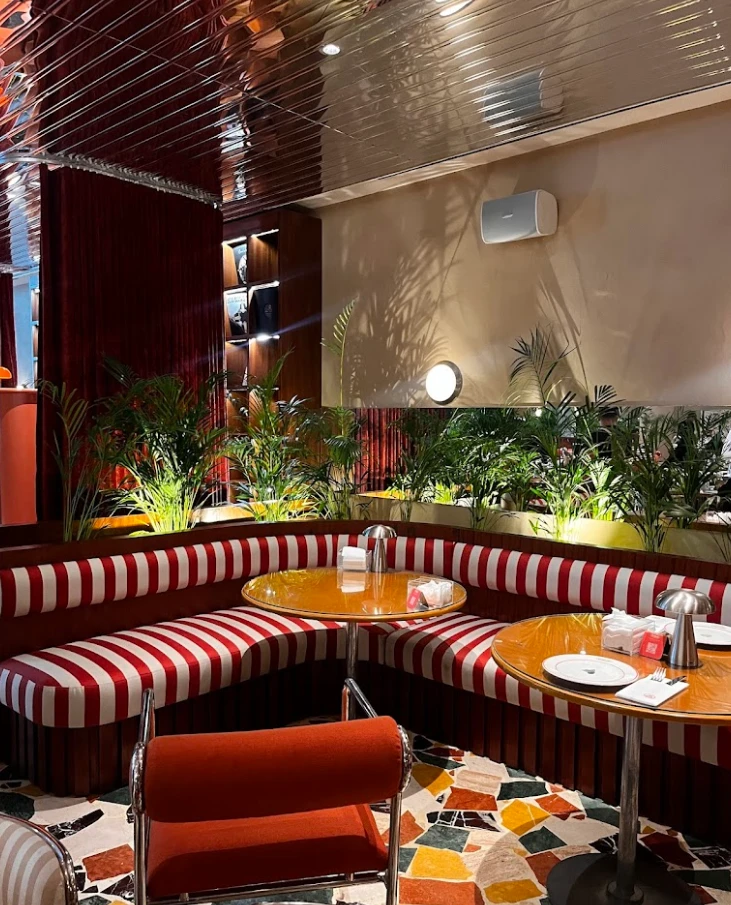 Striped seating area at PUBLIC Restaurant Riyadh As Sulimaniyah.