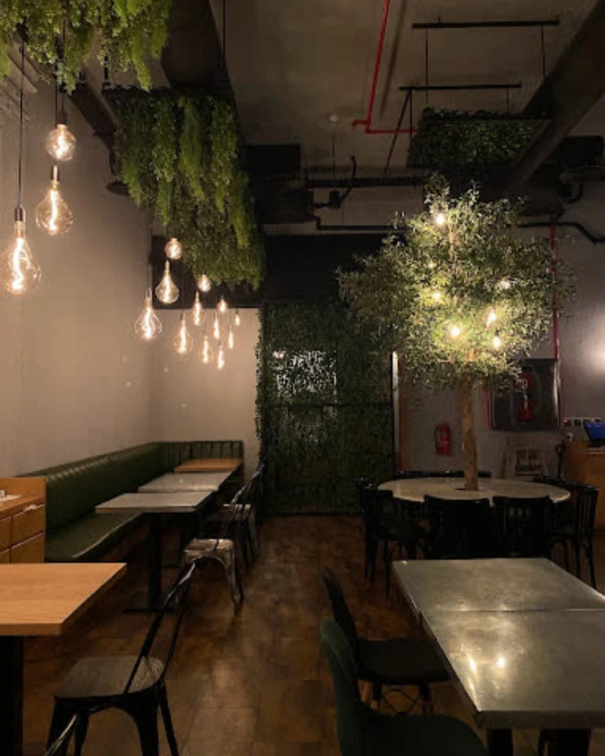 Cozy dining area with hanging lights, Swiss Butter Le Mall, Jeddah.