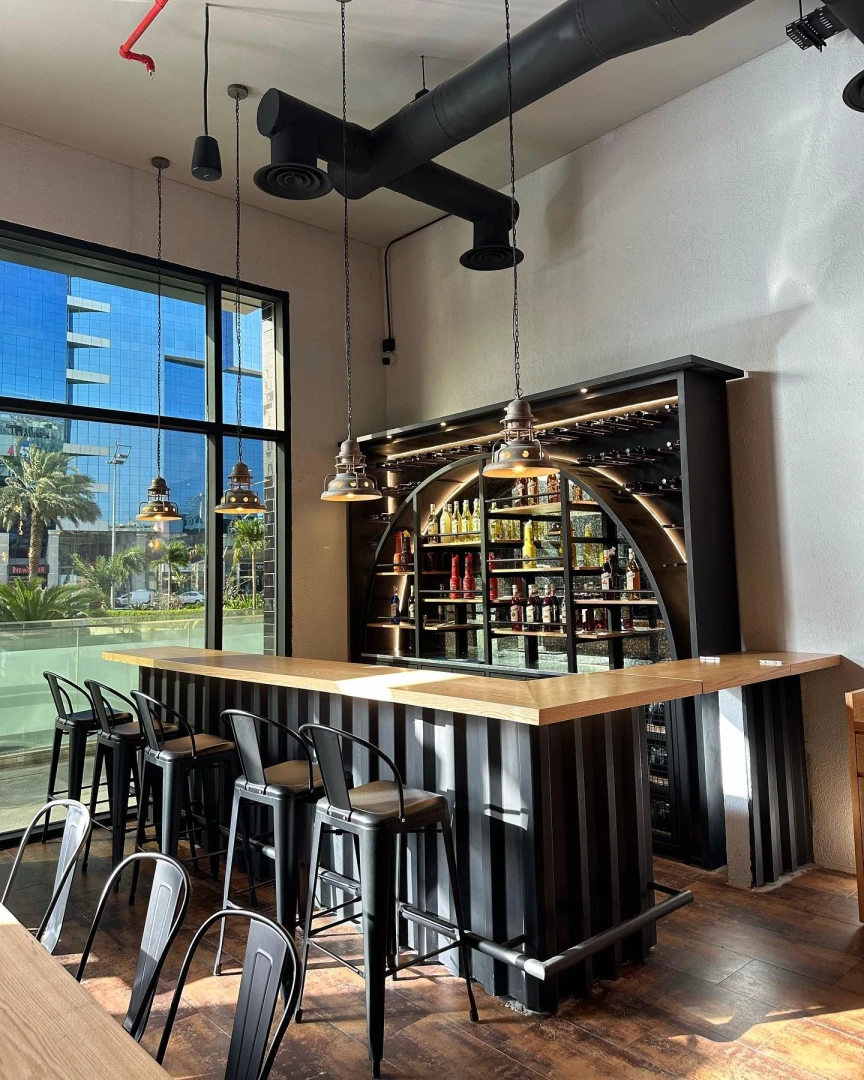 Modern bar interior at Swiss Butter Le Mall, Jeddah.
