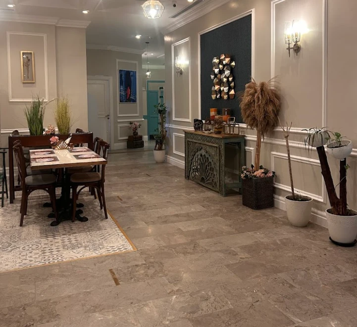 Sophisticated dining area with decorative plants at Makan, Jeddah.
