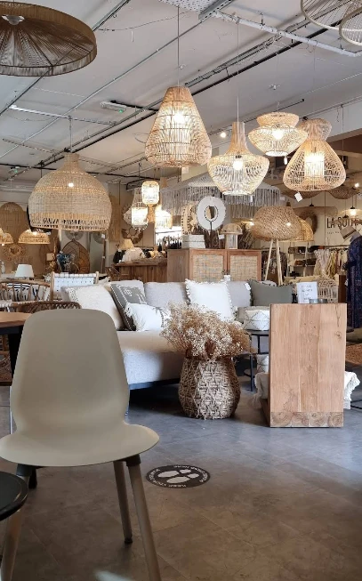 Cozy interior of Fiks Coffee Umm Suqeim, Dubai with wicker decor.
