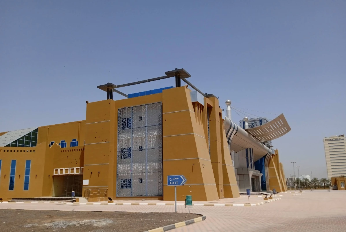 Rak Expo Center modern architecture in Ras Al-Khaimah under clear sky.
