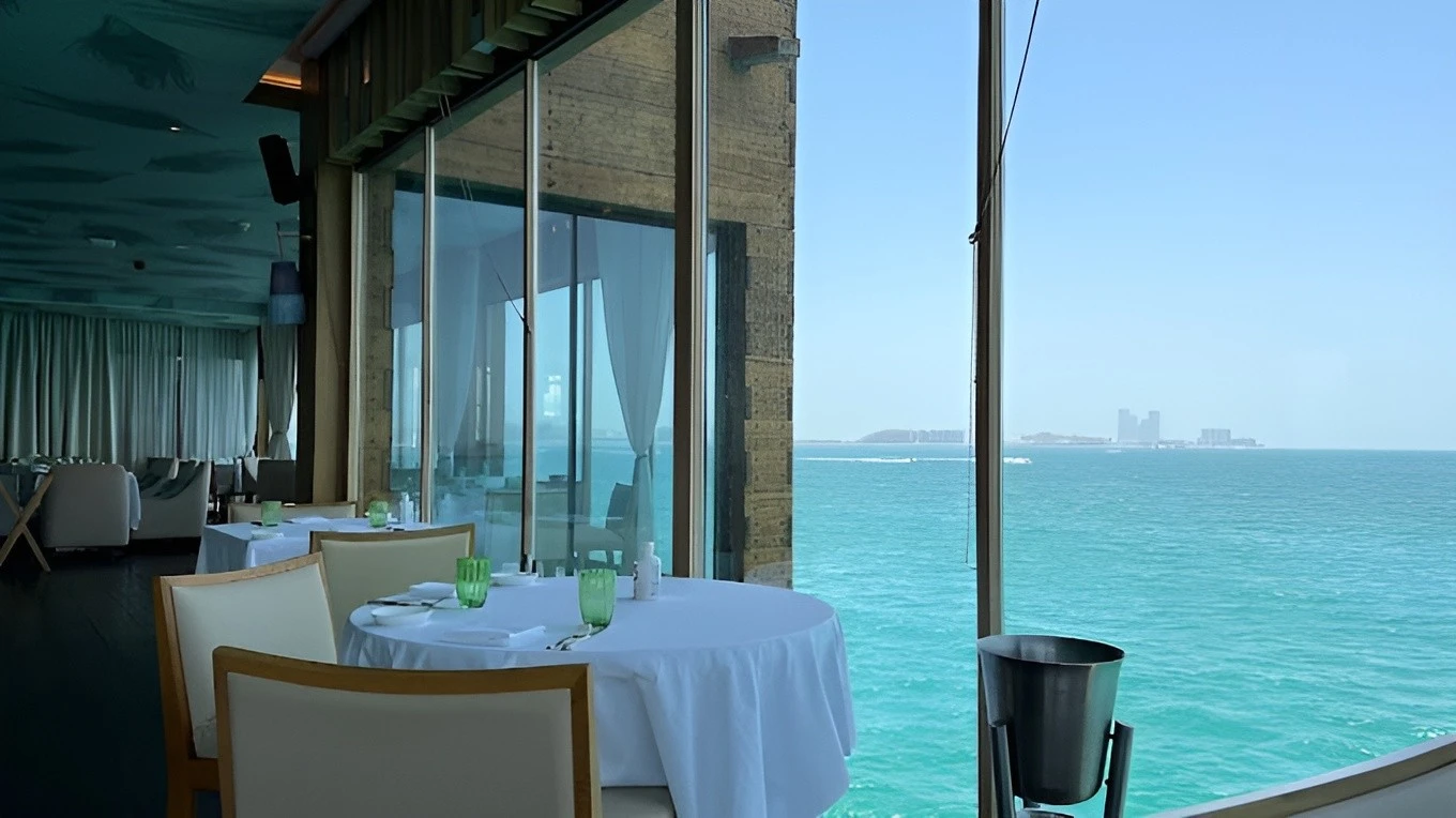 Pierchic Restaurant Dubai dining area with ocean view.