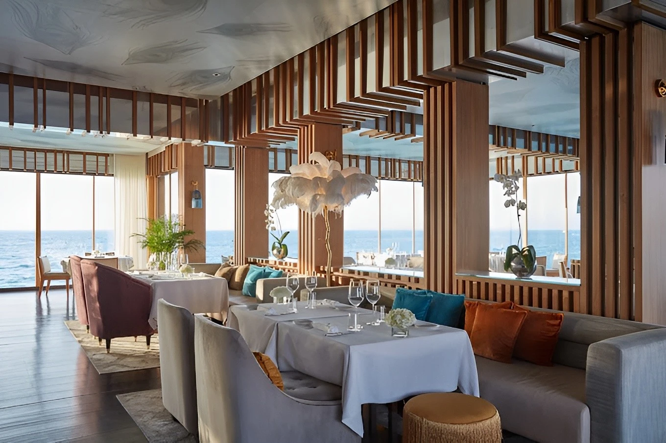 Elegant dining area at Pierchic Restaurant Dubai overlooking the sea.