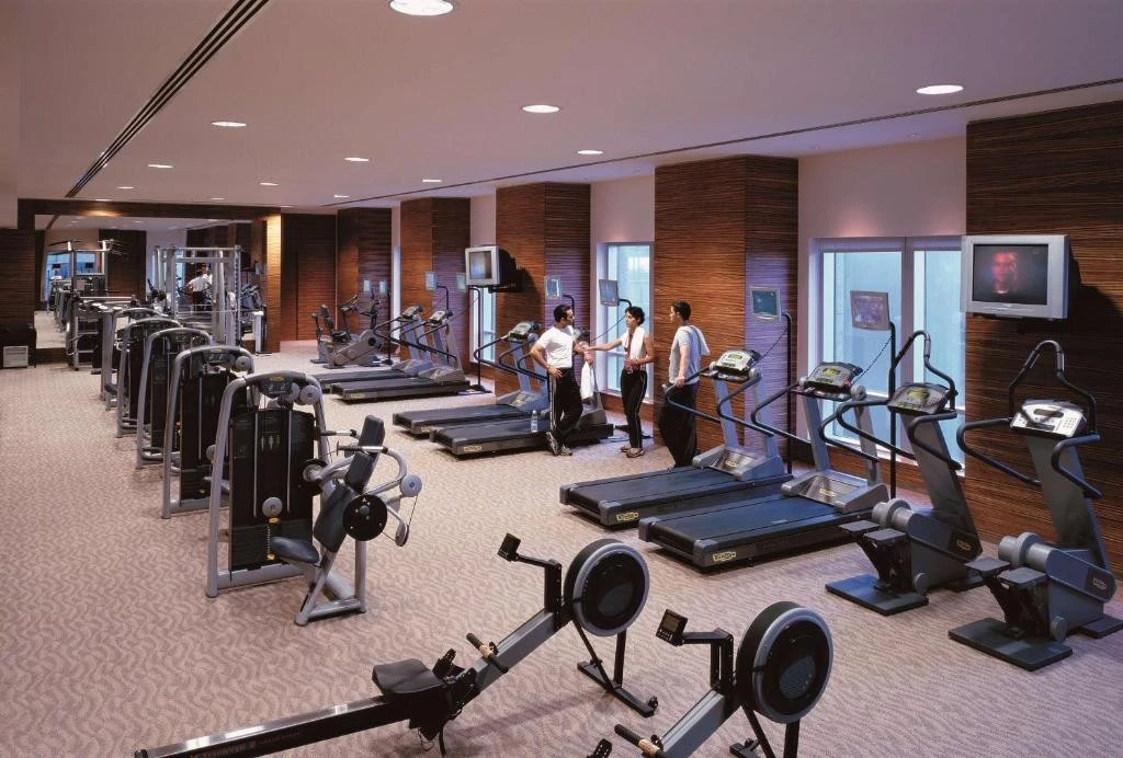 Modern gym with treadmills at Shangri-La Dubai.