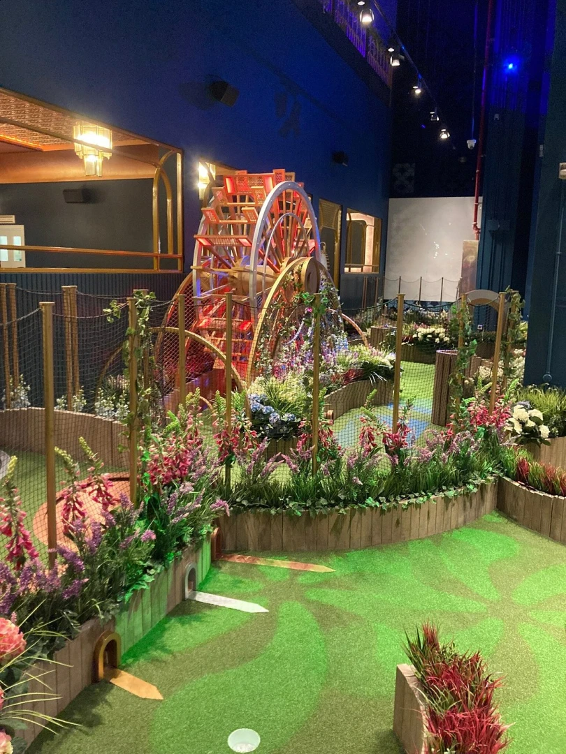 Colorful mini golf course at Swingers The Crazy Golf Club Dubai.