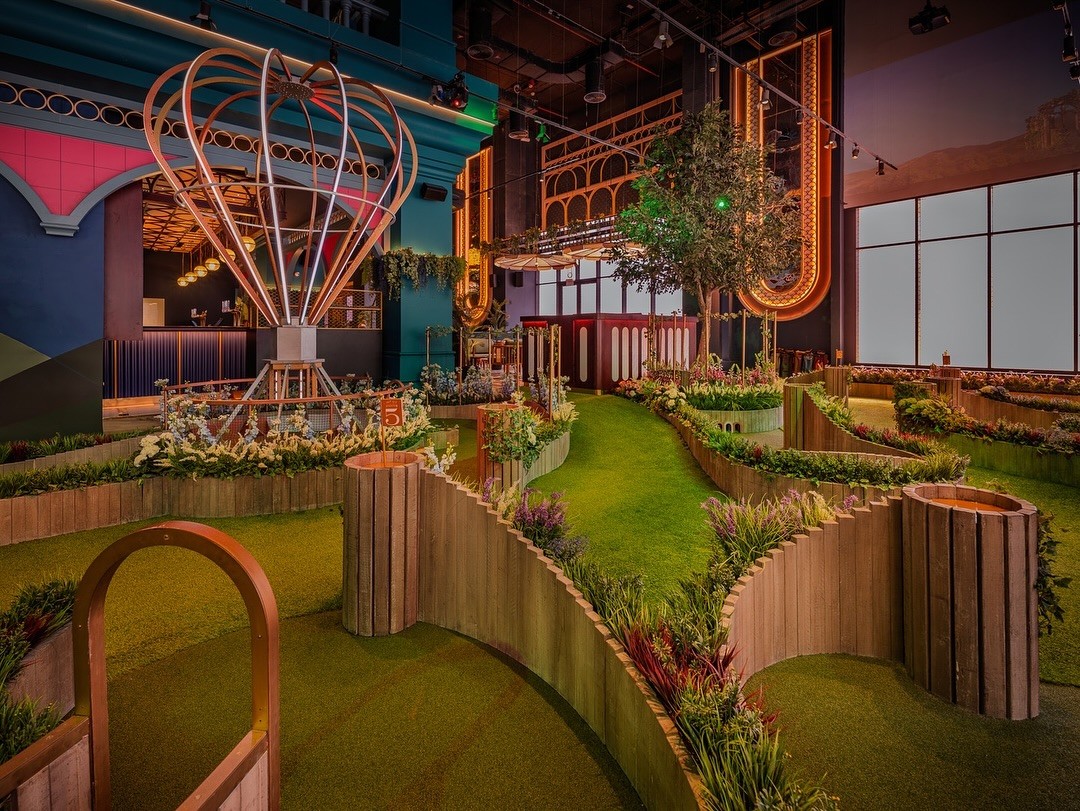Indoor mini golf course at Swingers The Crazy Golf Club Dubai.