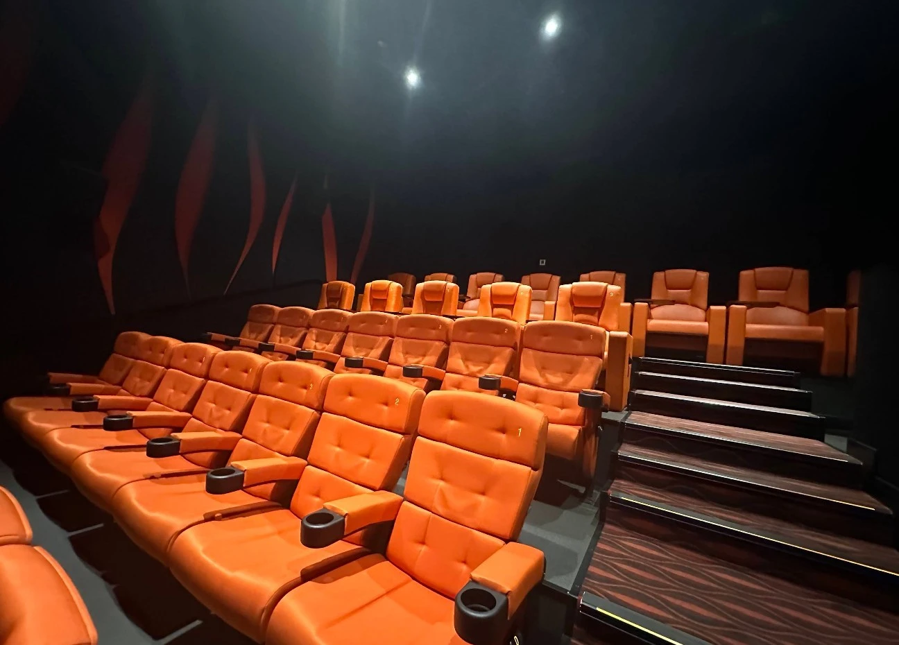 Orange seats in Novo Cinemas Msheireb, Doha theater.