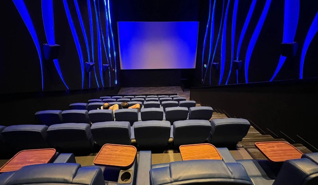 Novo Cinemas Msheireb Doha auditorium with blue lighting and seating