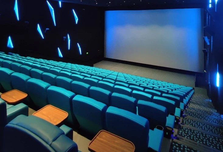Novo Cinemas Msheireb Doha auditorium with blue seats and screen