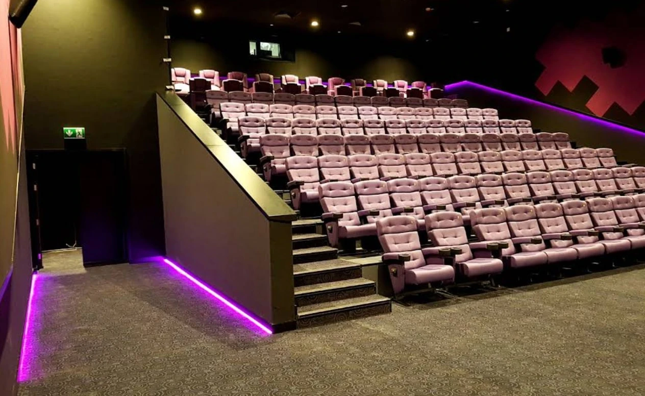 Novo Cinemas 01 Mall Doha, empty theater with purple seats.