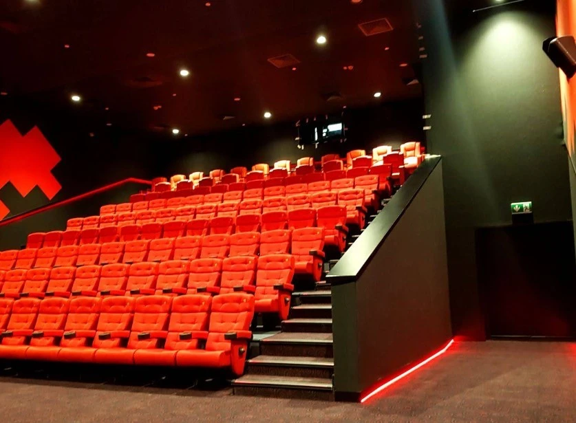 Red seats in Novo Cinemas, 01 Mall Doha, theater interior.