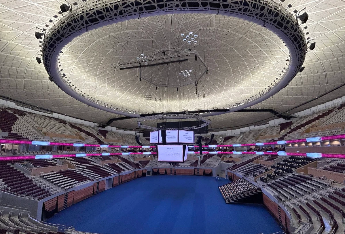 Interior of Lusail Multipurpose Hall, Doha, with seating and large ceiling.