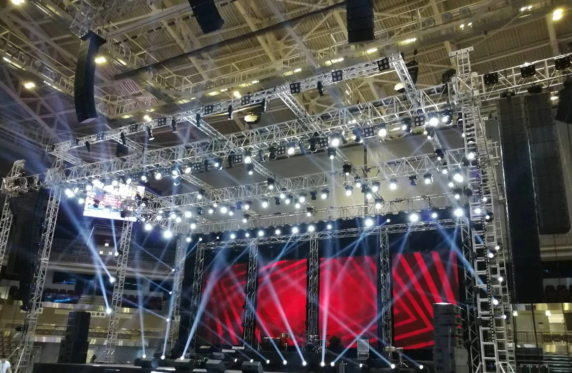 Stage setup with lights at Ali Bin Hamad Al Attiyah Arena, Doha.
