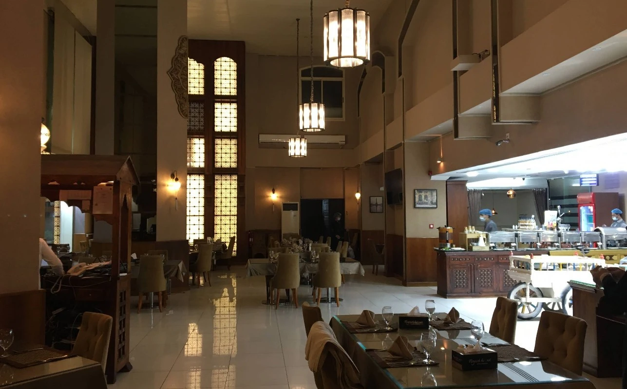 Interior of Nayaab Haandi Pakistani Restaurant in Dubai, elegant dining setup.