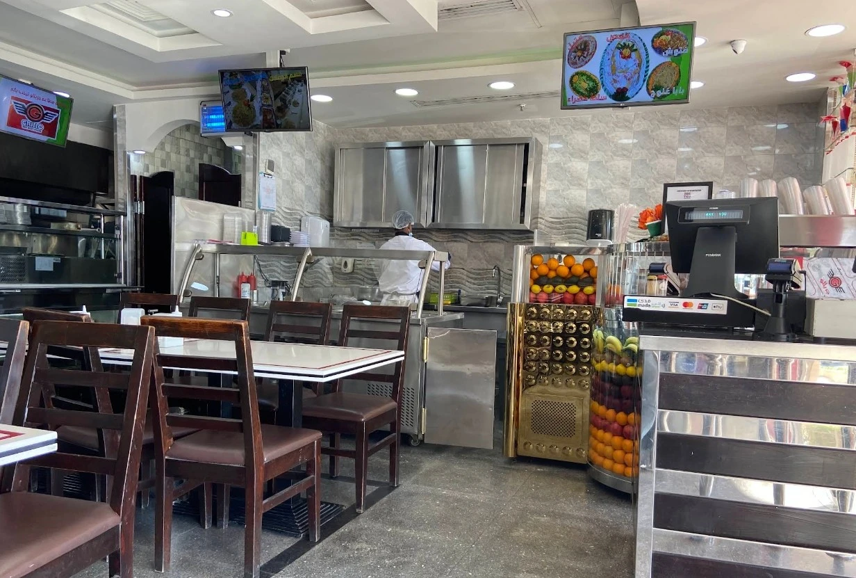 Interior of Grillo Restaurant Fanateer, Al Jubail with dining area.