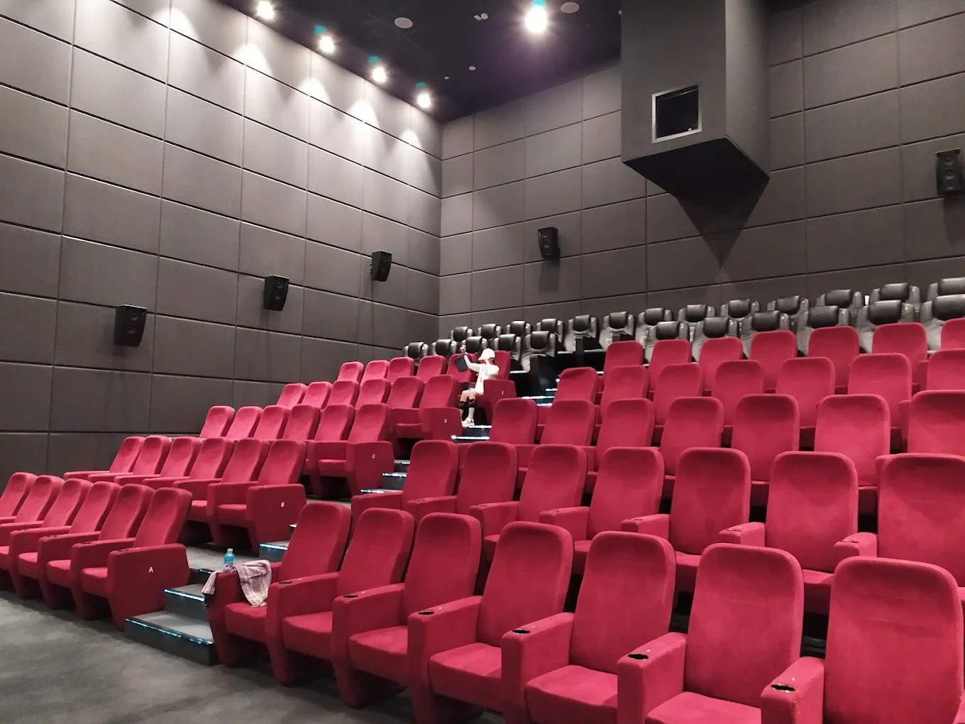 Empty red seats in Flik Cinema, Al Mirqab Mall, Doha.