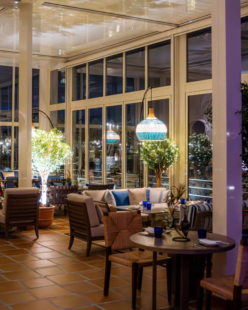 Elegant dining area at Yamaz Restaurant Bahrain, Manama with ambient lighting.