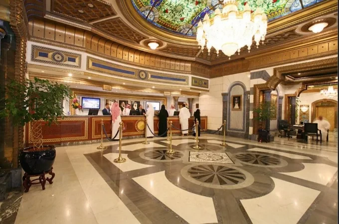 Elegant interior of Tuheed Pakistani Restaurant, Makkah with ornate ceiling.
