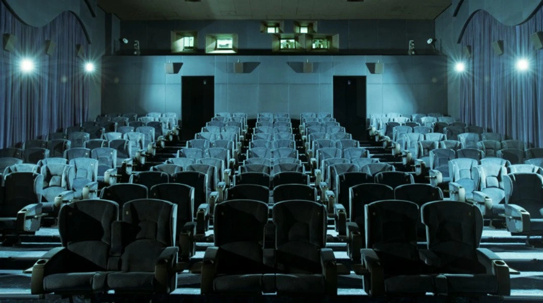 Empty theater seating at Reel Cinemas, Dubai Marina Mall.