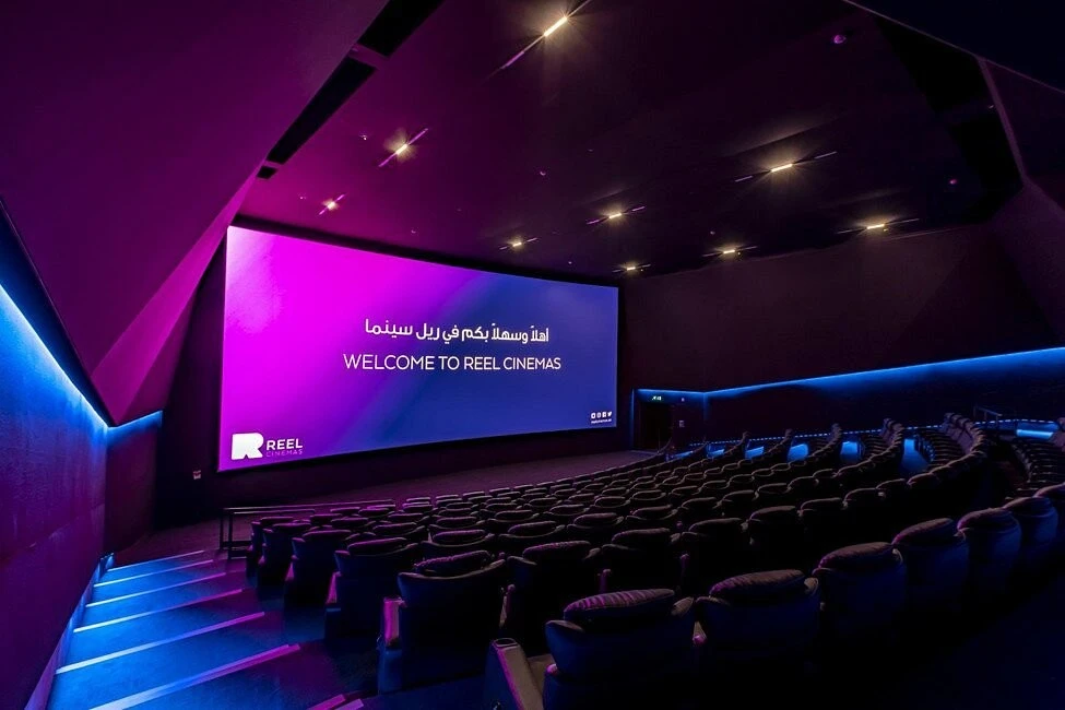 Reel Cinemas auditorium with large screen, Dubai Marina Mall.