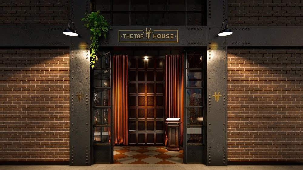 Entrance of The Tap House Dubai Hills, brick facade, warm lighting.