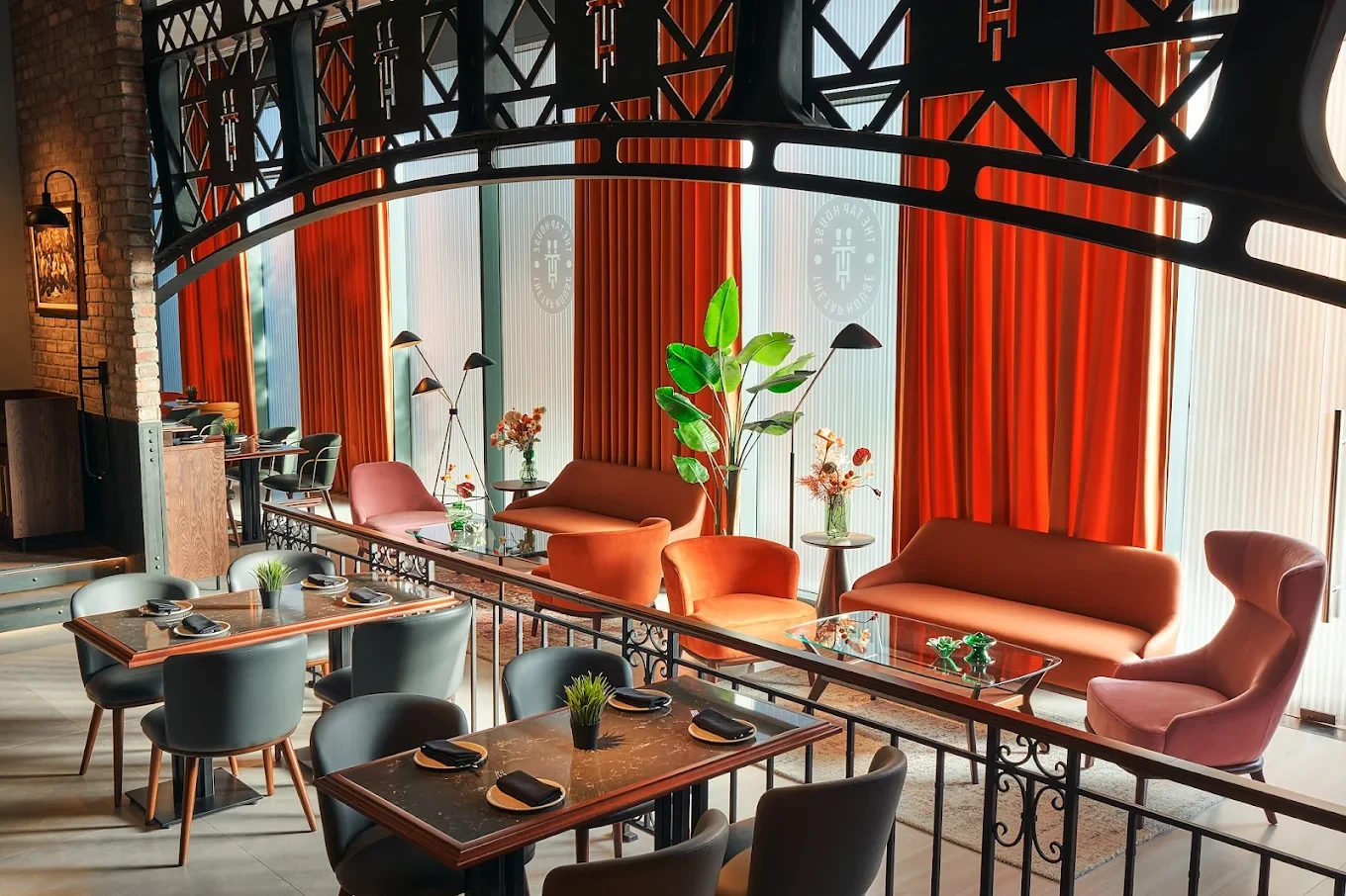 Modern interior of The Tap House Dubai Hills, featuring cozy seating.