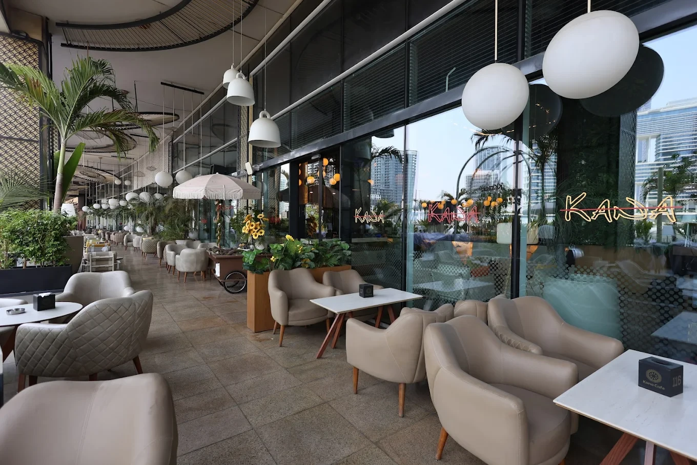 Outdoor seating at The Kana Cafe Downtown Dubai with modern decor.