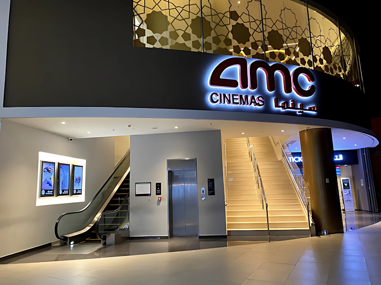Entrance of AMC Cinemas Panorama 10, Riyadh with escalator and stairs.