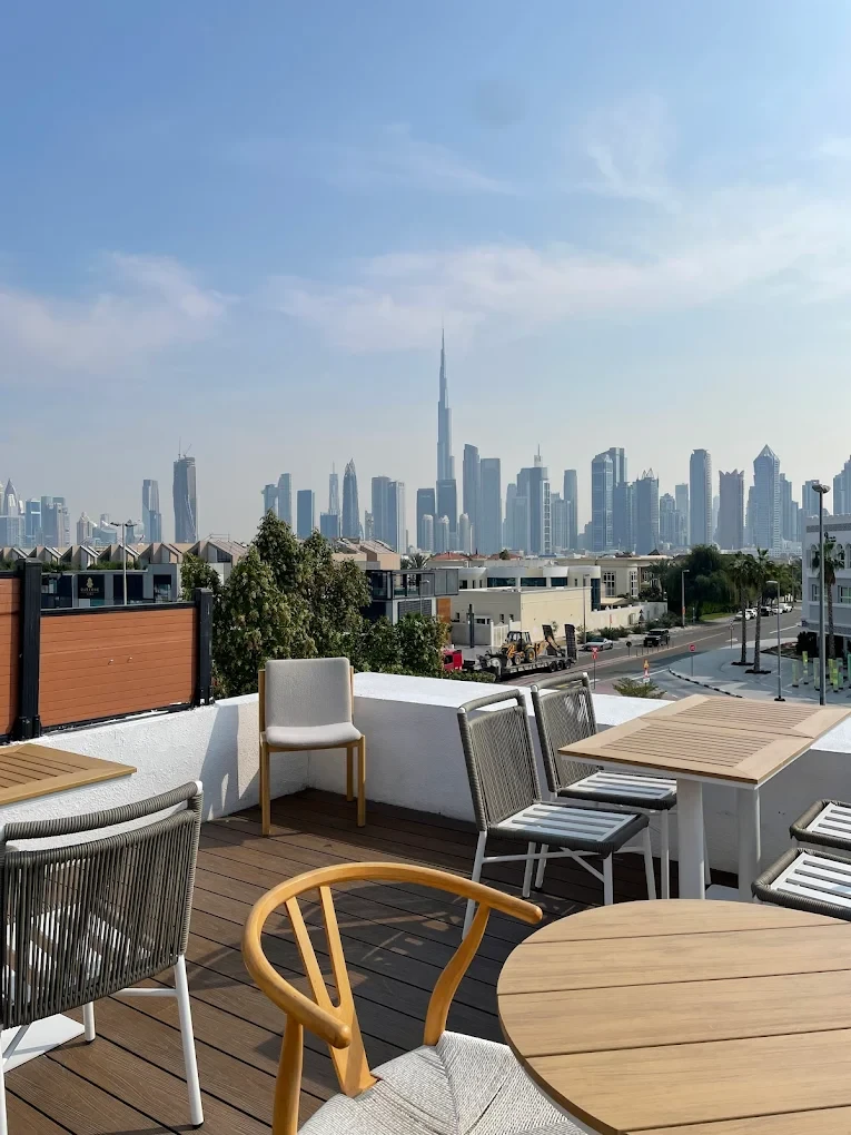 Savva All Day Lounge terrace with Dubai skyline view.