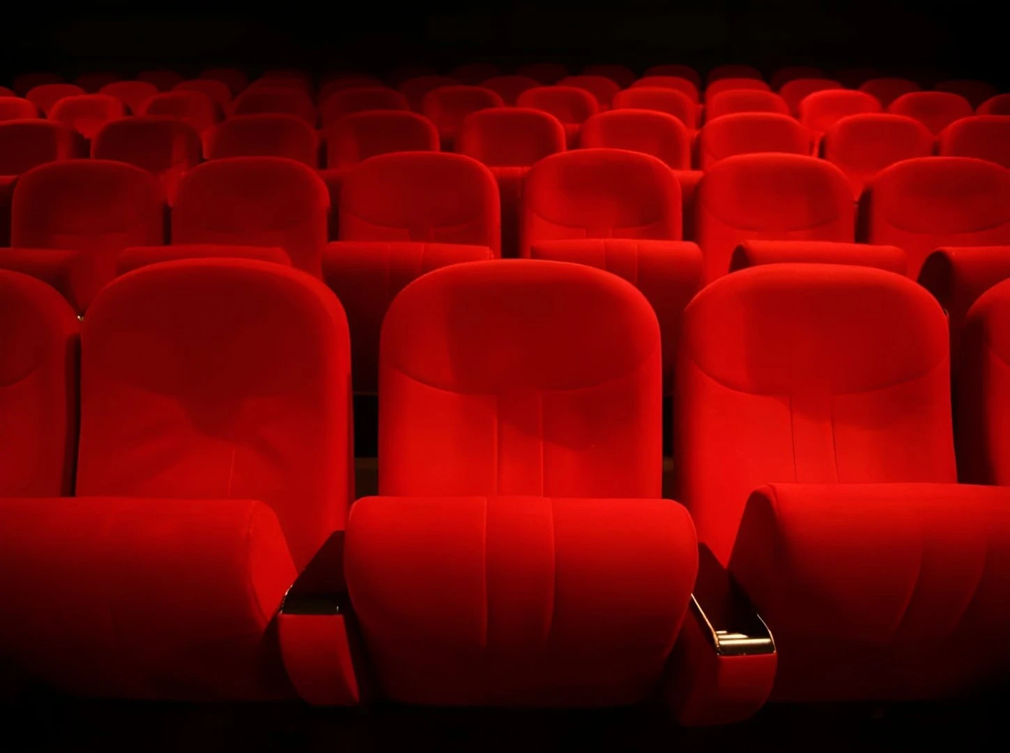 Red theater seats at Gulf Cinema Ras Al Khaimah.