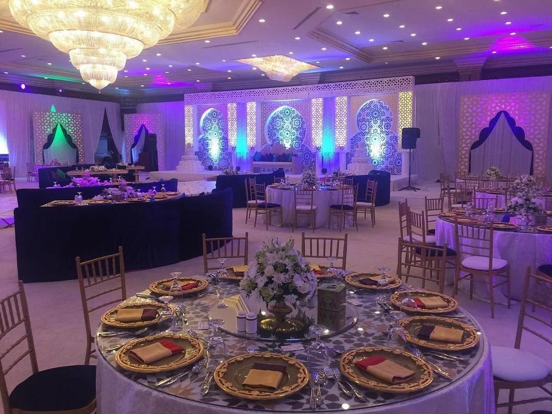 Elegant event setup at Regency Hall Doha with decorative lighting.