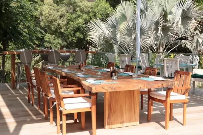 Outdoor dining area at The Farm Restaurant Al Barari, Dubai.