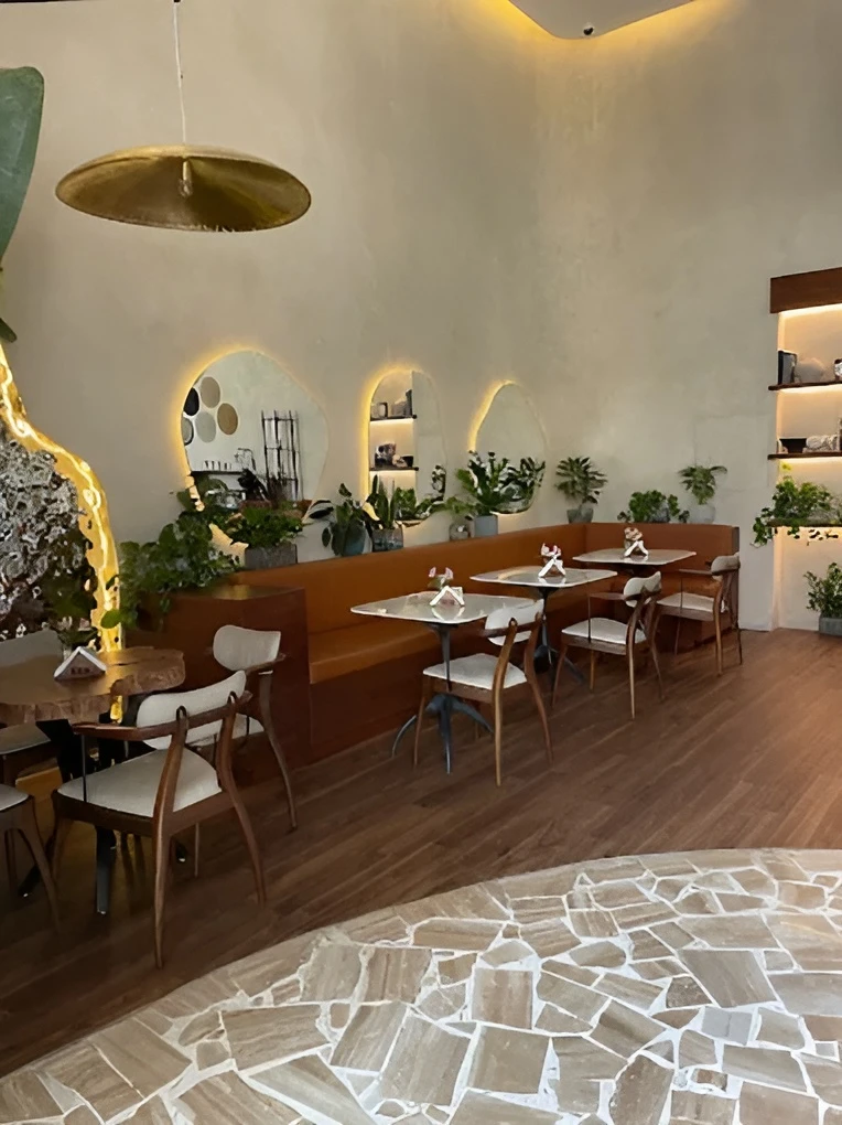 Cozy interior of Era Restaurant Doha with elegant seating and decor.