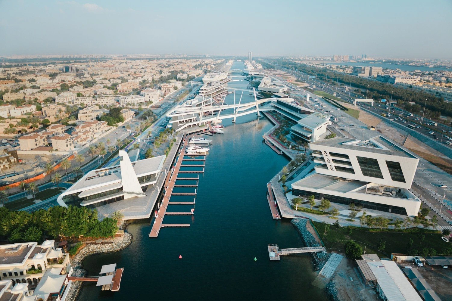 Aerial view of Al Qana waterfront, Abu Dhabi, modern architecture and marina.