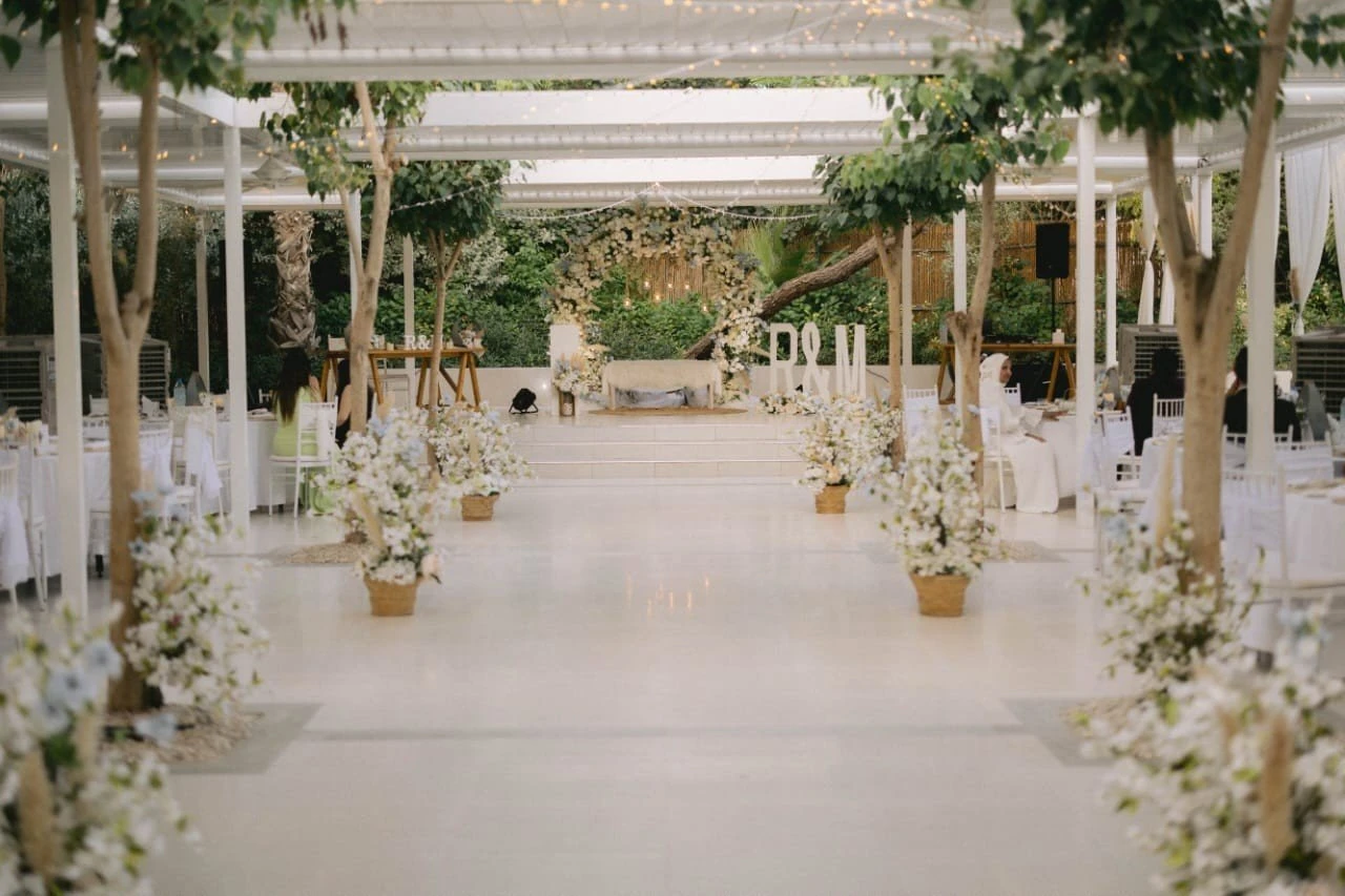 Elegant garden event setup at The Farm Restaurant, Al Barari, Dubai.