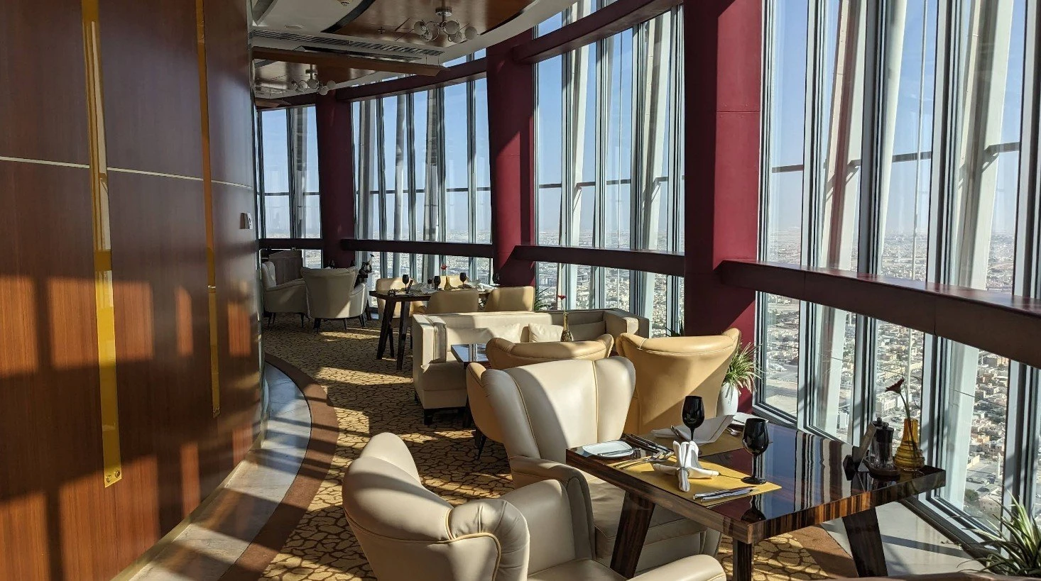 Chic dining space with panoramic city views, Three Sixty Restaurant Doha.