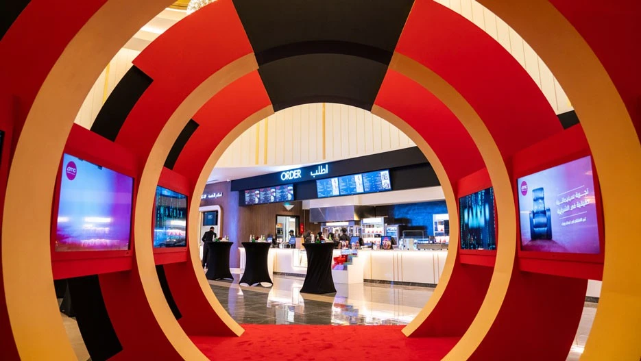 AMC Cinemas Ajdan Walk Al Khobar entrance with colorful decor.