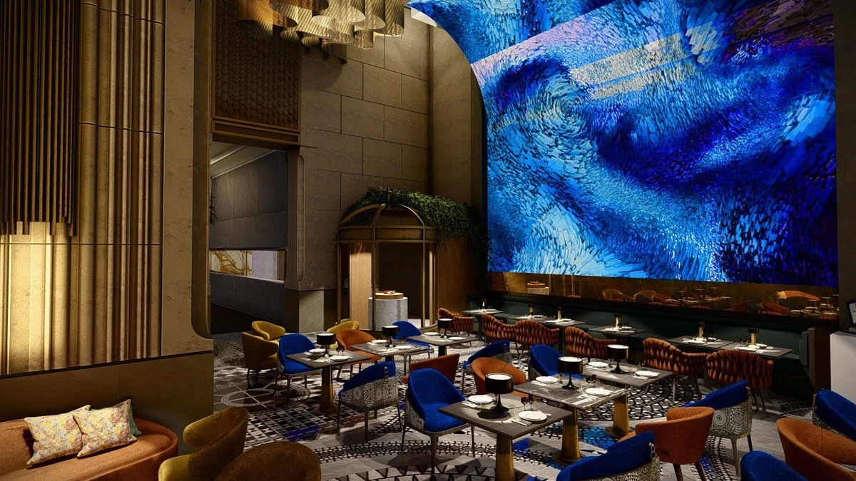 Zenon Restaurant Dubai interior with colorful seating and large blue mural.