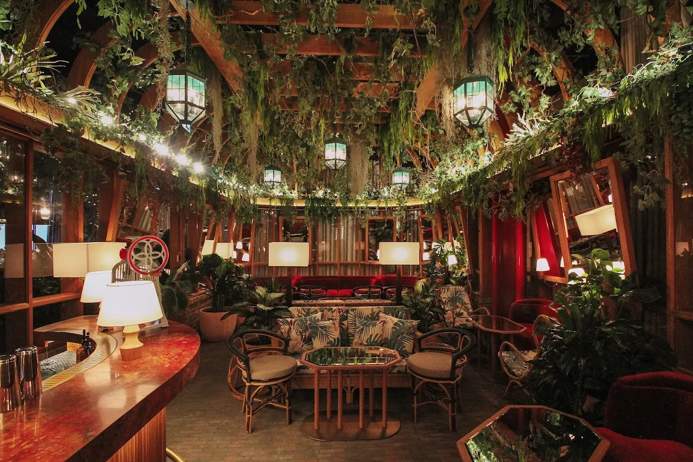 Luxurious interior of The Guild Dubai with lush greenery decor.