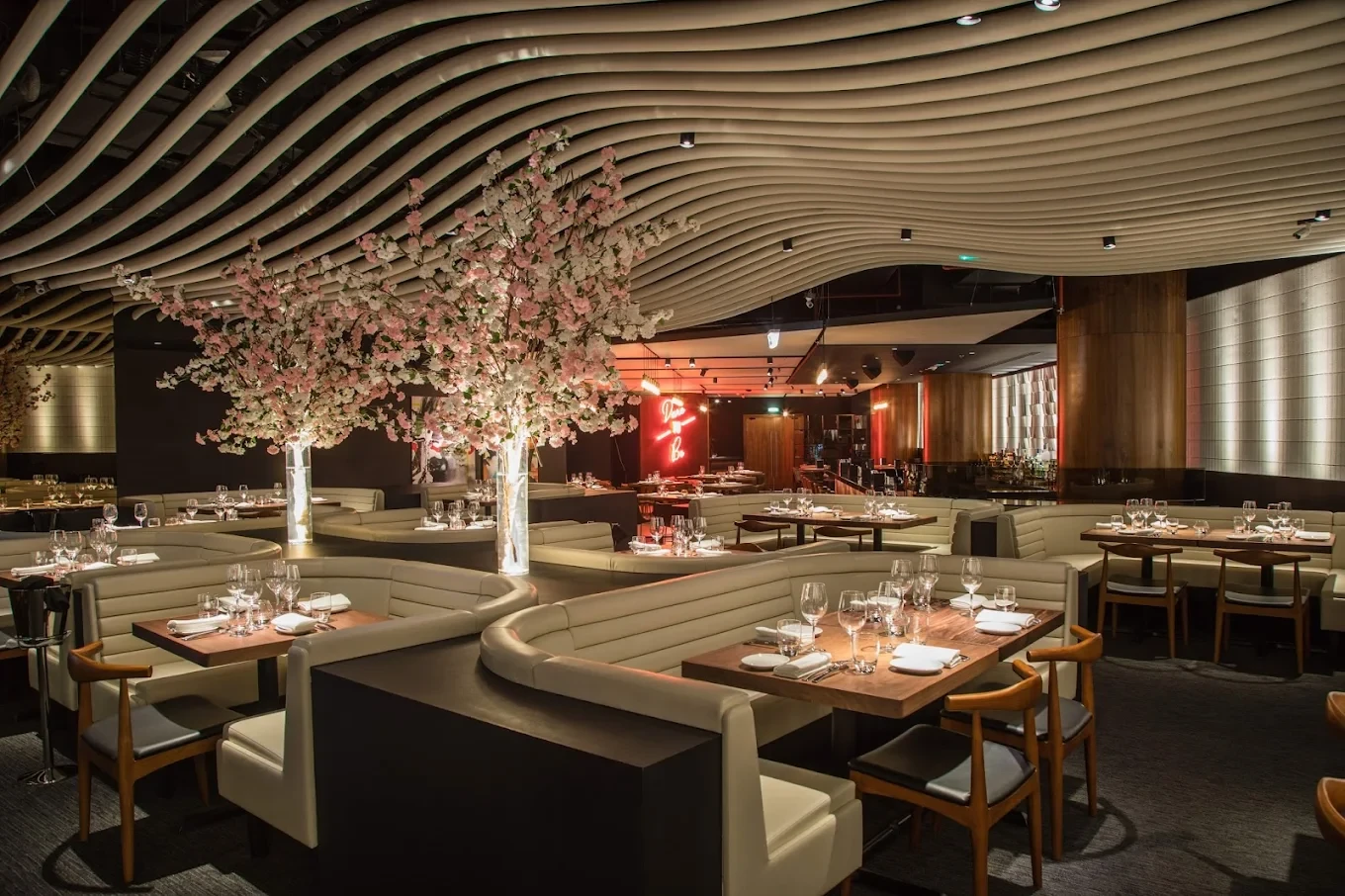 Elegant dining area at STK Dubai JBR with decorative ceiling.