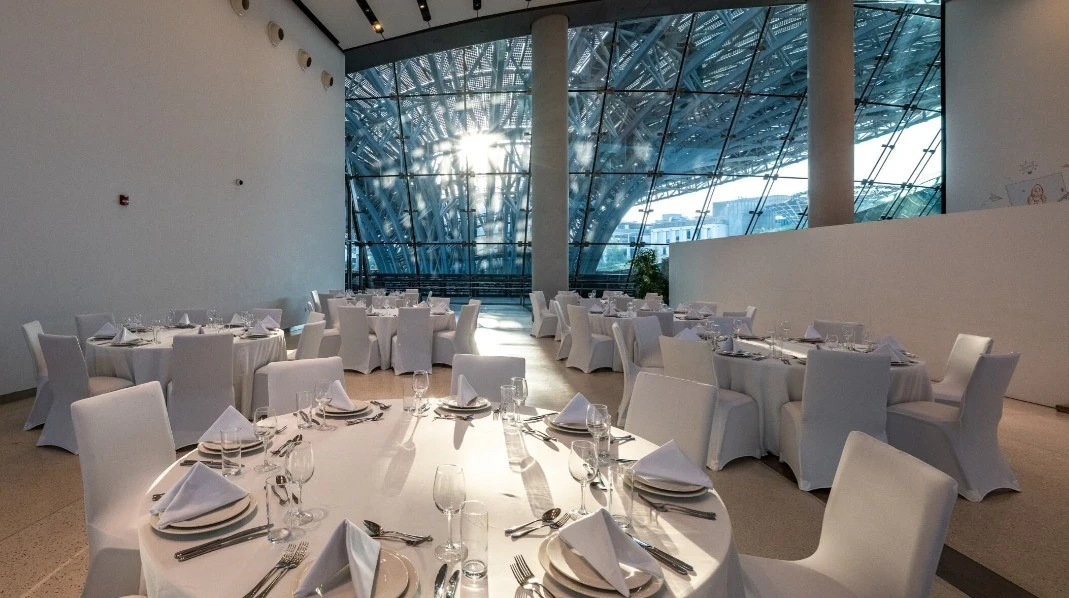 Elegant dining setup at Expo City Dubai's Innovation Gallery.