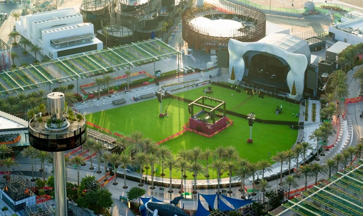 Aerial view of green lawn and stage, Jubilee Park, Expo City Dubai.