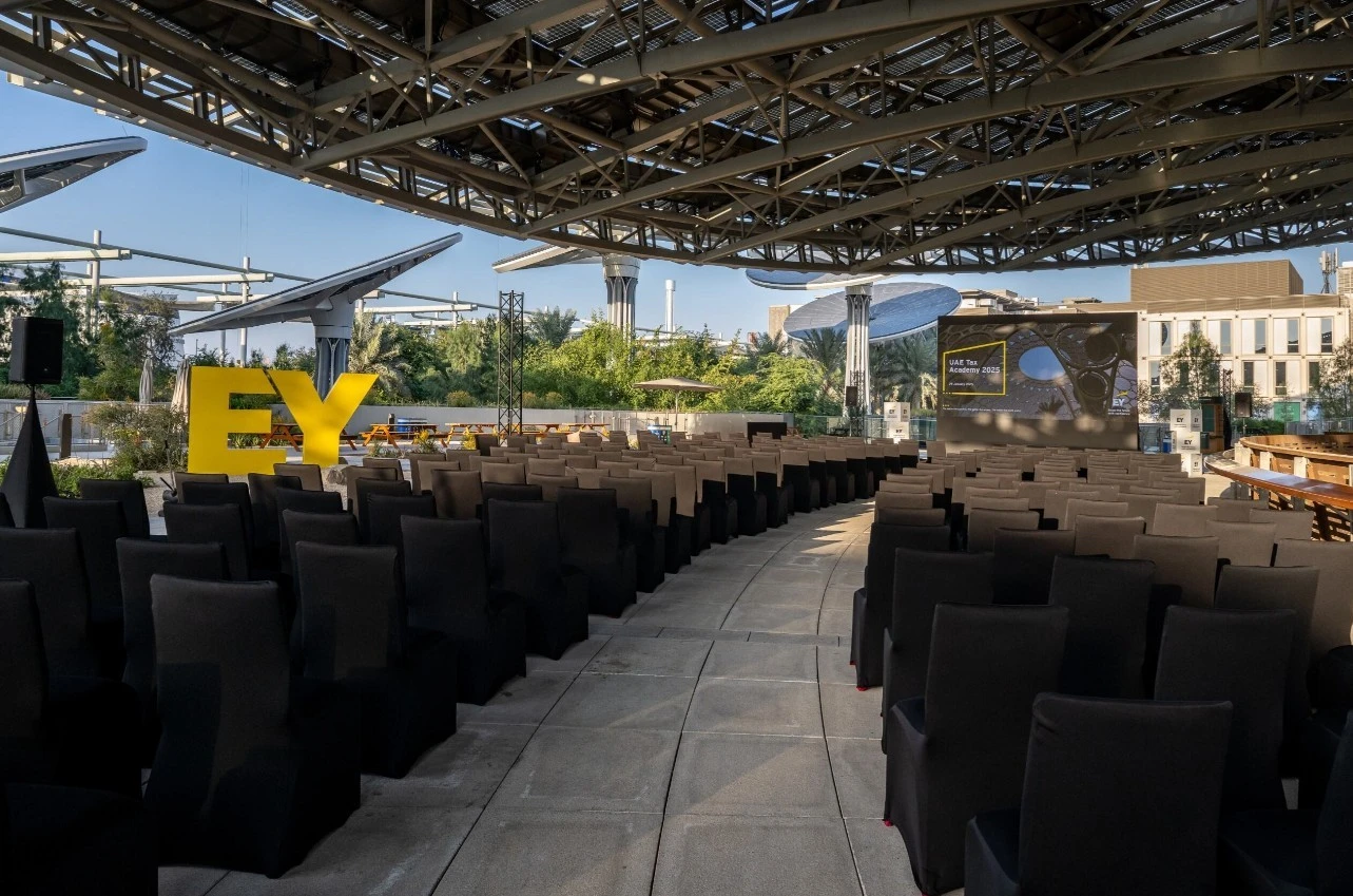 Expo City Dubai Terra Terrace with seating and large screen.