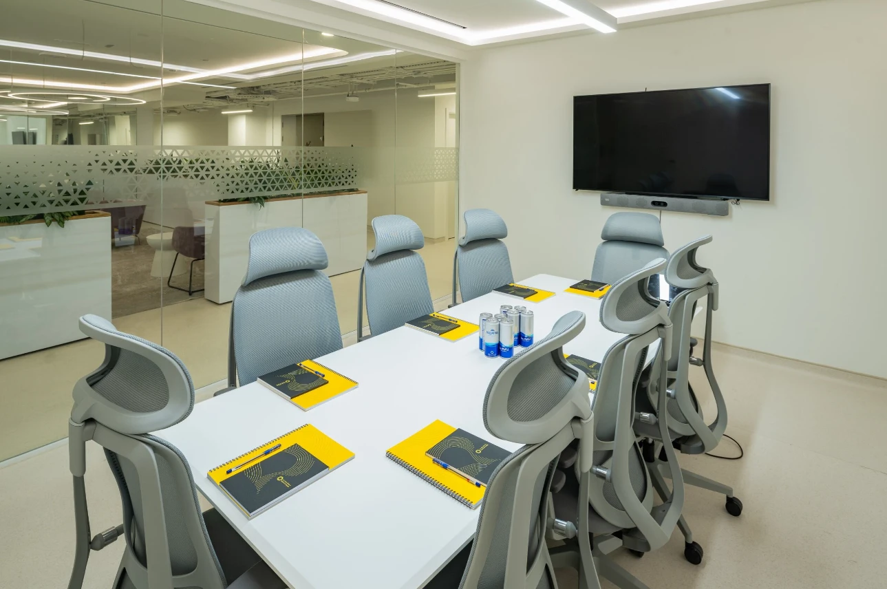 Modern conference room at Expo City Dubai with chairs and table.