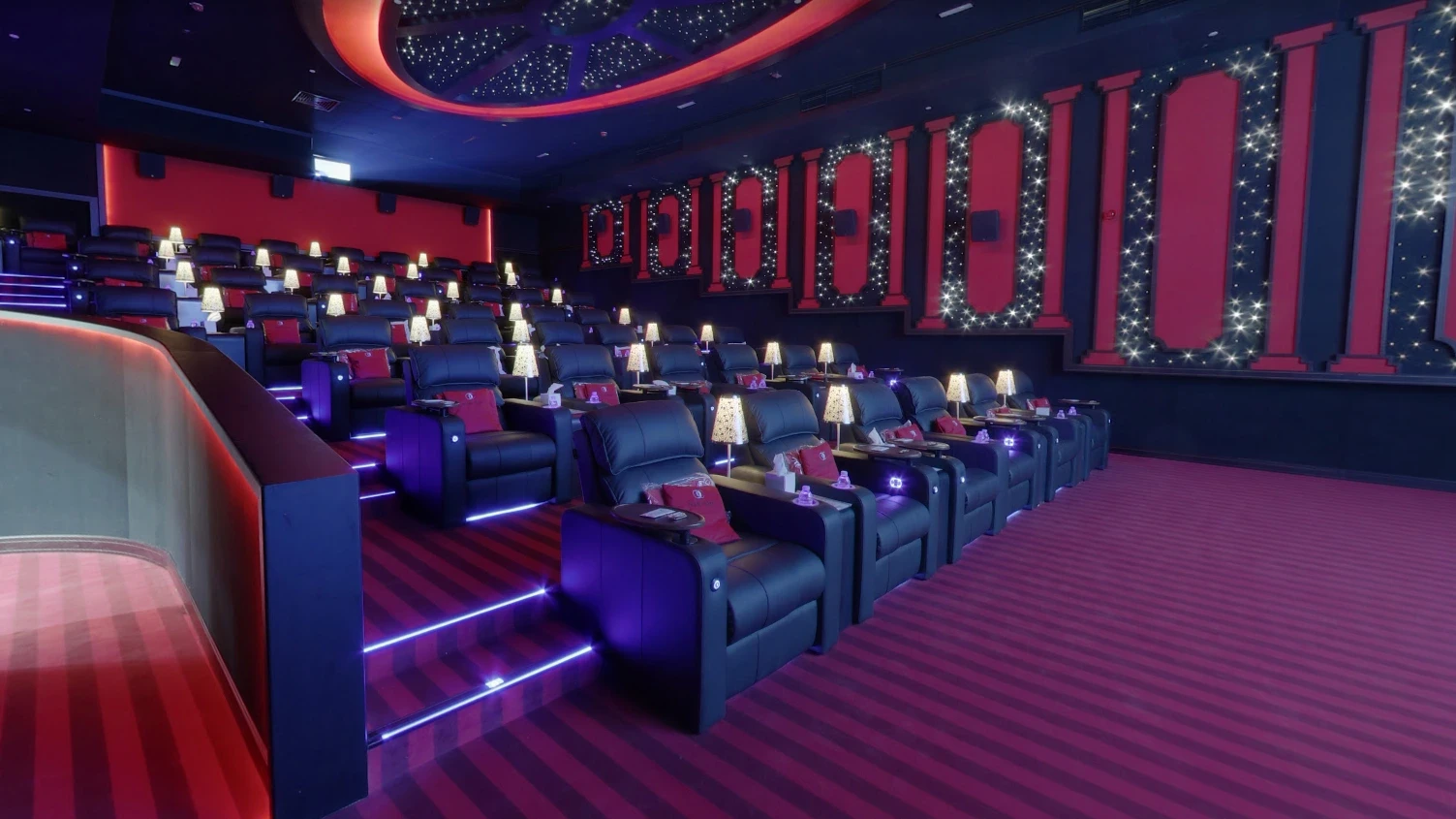 Plush recliners with ambient lighting, Star Cinema, Abu Dhabi.