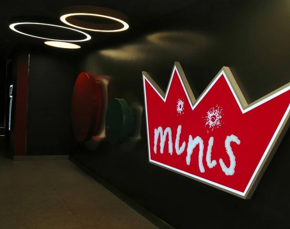 Empire Cinema Al Ahsa Al Hofuf hallway with illuminated signs.
